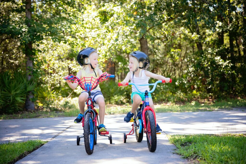 two girls on a bikes