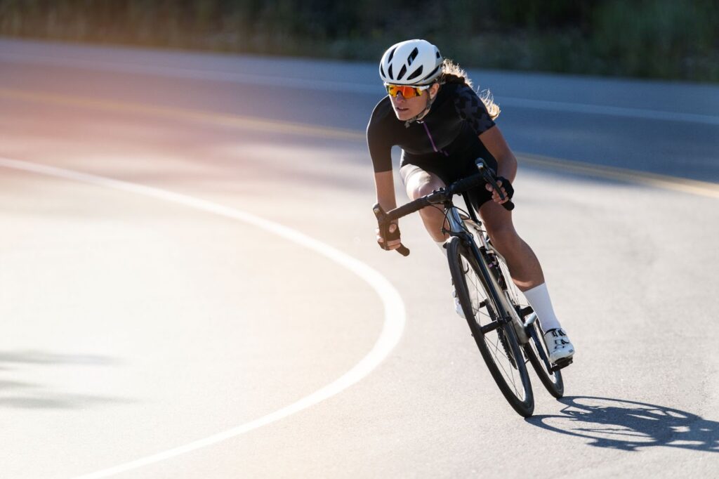 Woman riding a bike on the road